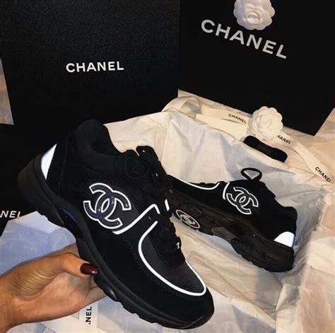 black chanel reflective trainers|Chanel black and white sneakers.